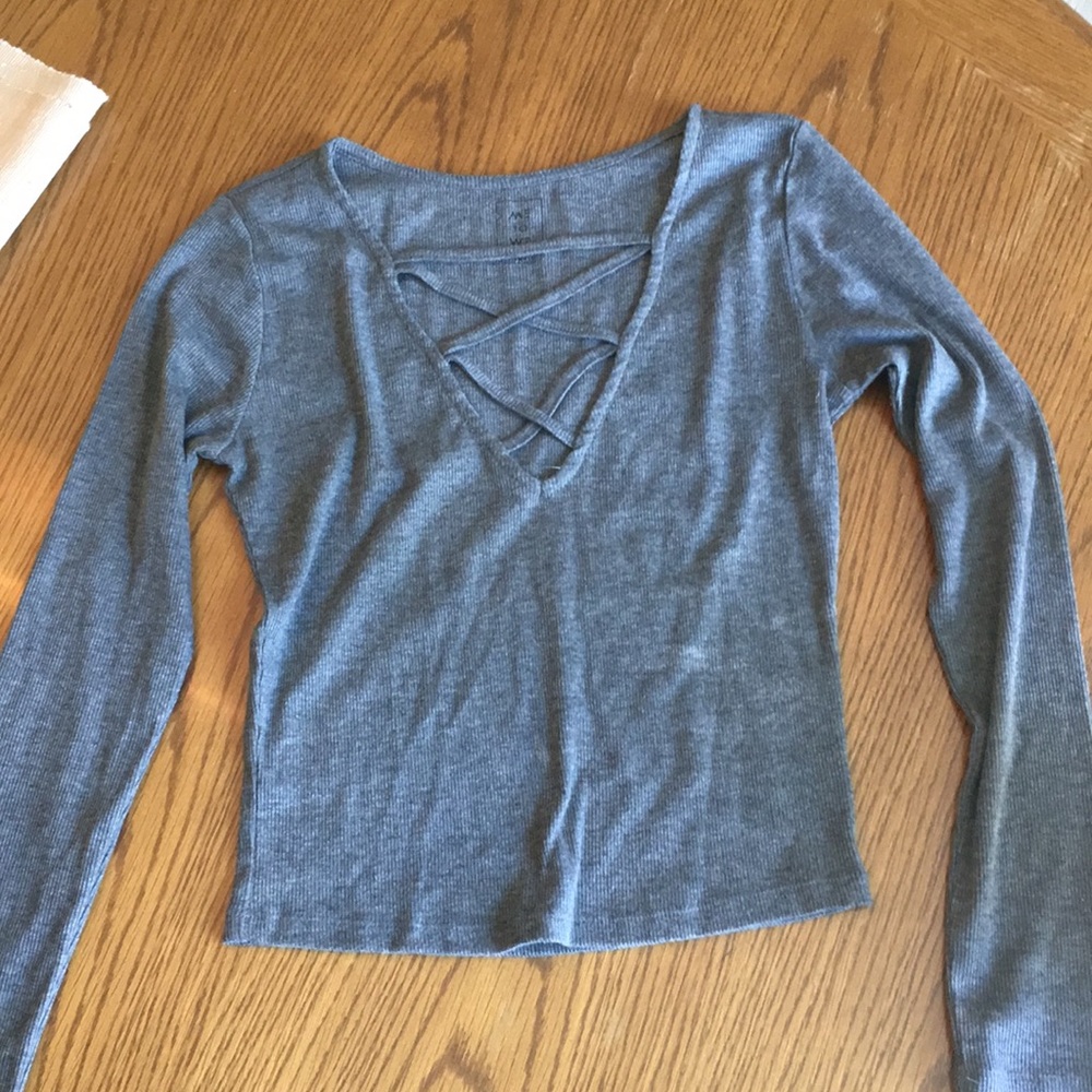 Long sleeve criss-cross v-neck pac sun shirt